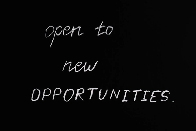 chalkboard writing that says Open To New Opportunities